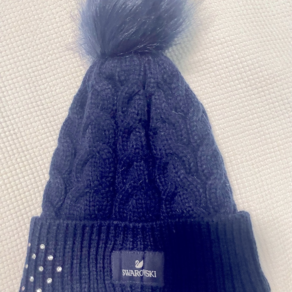 Swarovski blue beanie limited edition! Never worn. Keep your love warm! :)